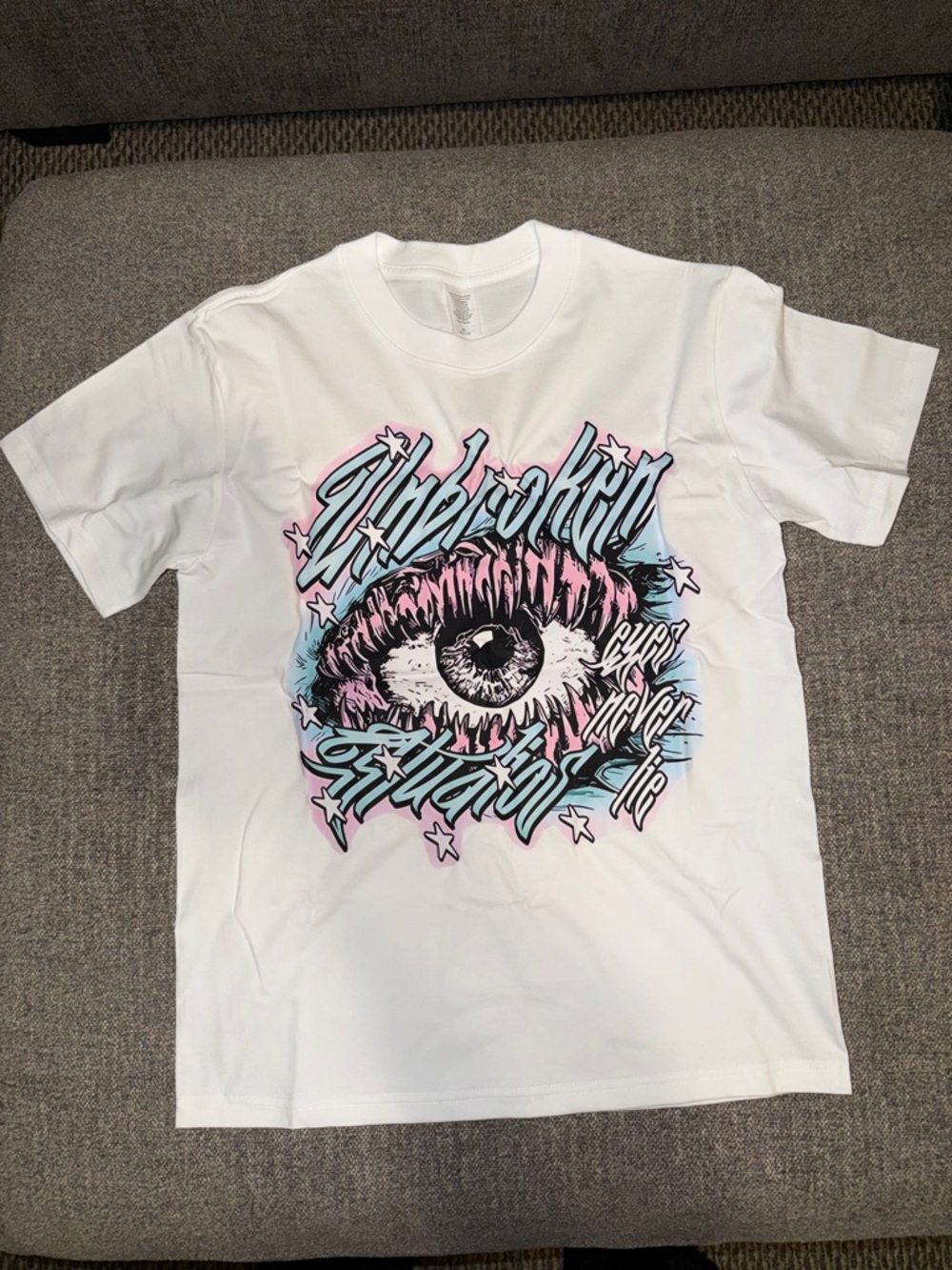 SHEIN White Tee with Pink & Light Blue Graphic Eye Design